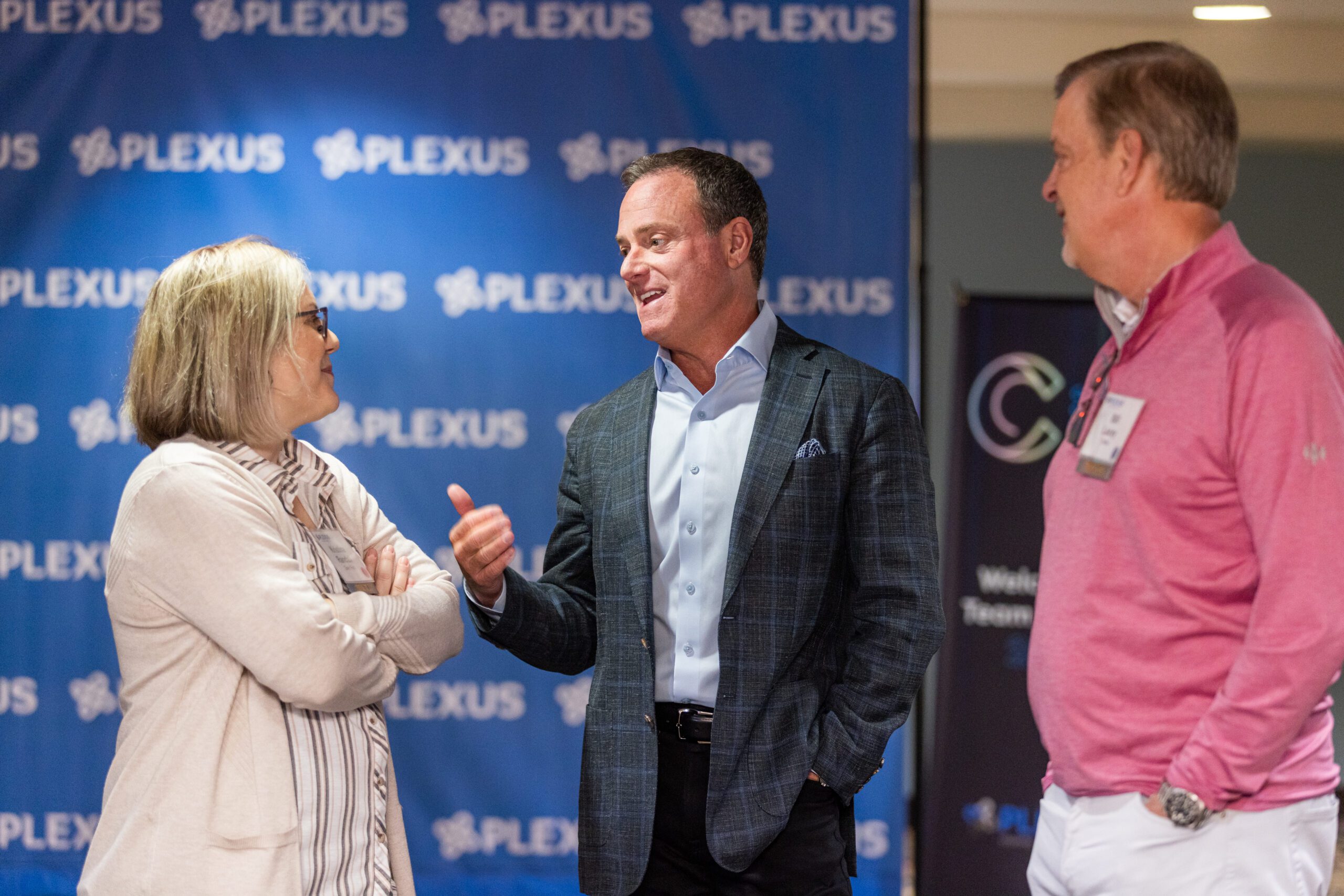 Leaders talking at annual Plexus Team Building event.
